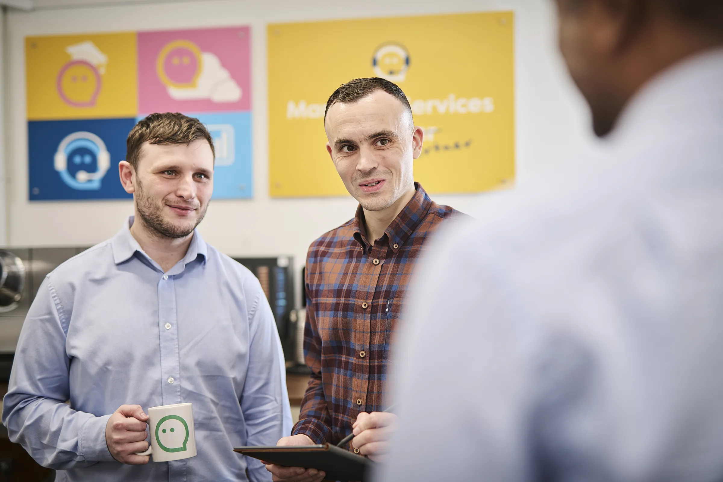 Osiris team presenting Cyber Essentials certification credentials.