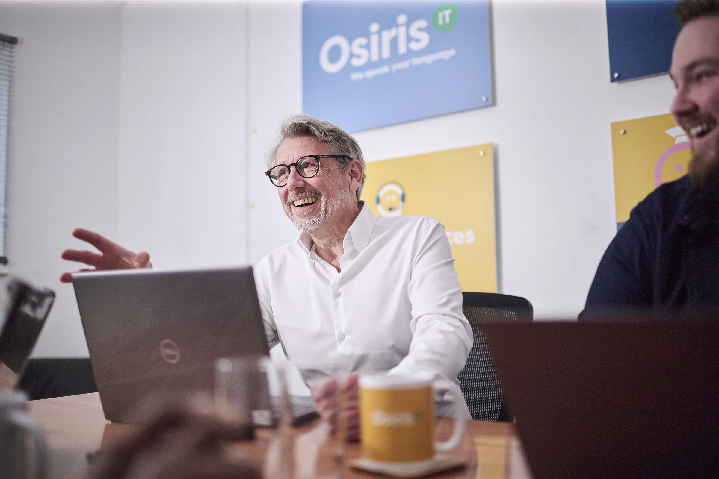 Osiris consultants in a boardroom-style technology planning meeting.